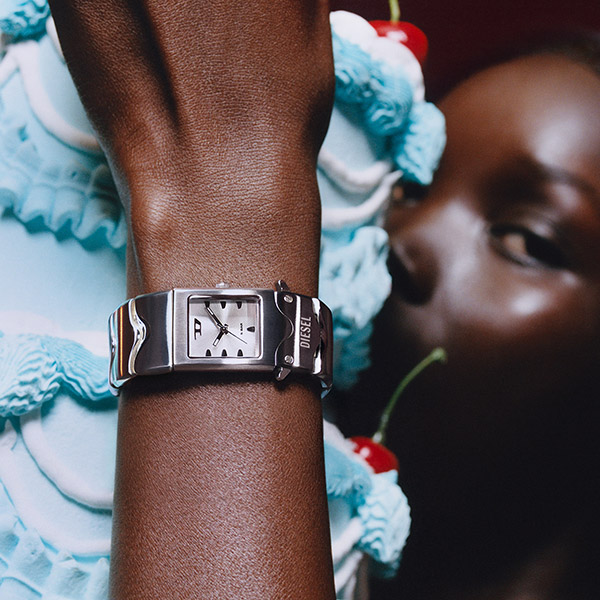 An image of a woman wearing a watch from the new Diesel Spring Summer 2025 collection.